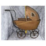 Antique wicker doll carriage