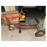 Antique pedal tractor