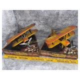 Pair of red diamond biplane toys in original box