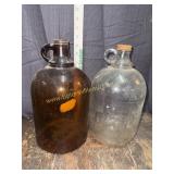 Amber and clear gallon bottles