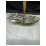 Green vintage dish full of forks