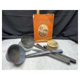 Enamel ladle and other scoops, cookbook and soap