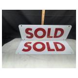 2 metal red sold signs