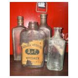 4 antique bottles