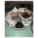 Collection of small pitchers, creamers, gravy