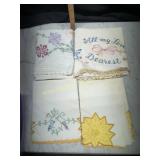 4 odd hand stitched pillow cases