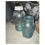 Two blue fruit jars