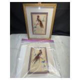 Pair of Mexican feather art birds one in frame