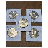 Five Kennedy half dollars (4) 1998 D (1) 1996 P