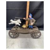 Cast iron magician and dog pull toy