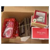 Box with travel mugs, plaid frames and slide