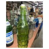 Green glass swing top bottle