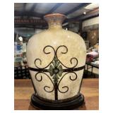 Vase with metal cage overlay