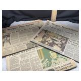 Elvis passing newspapers