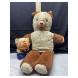 Vintage teddy bear and piggy bank