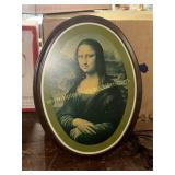 Vintage metal wall art of the Mona Lisa