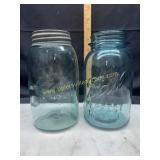 2 blue fruit jars one with zinc lid
