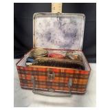 Shoe shine in metal plaid box