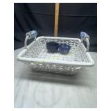 Wicker basket with white and blue porcelain