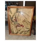 Framed needlework bird