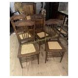 4 press carved back oak chairs with cane seats