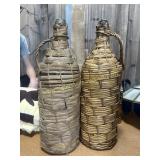 2 wicker wrapped demijohn bottles
