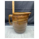 Brushed McCoyï¿½s brown barrel pitcher