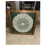 Framed handmade crocheted doily