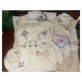 Group of vintage embroidered linens- table