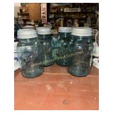 4 blue fruit jars with zinc lids