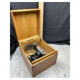 Wooden box with cameras and accessories