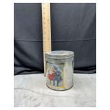 Round metal Christmas tin with children graphics