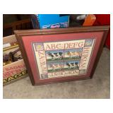 Framed alphabet and cow cross stitch