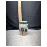 Ceramic speckled birdhouse motif jar
