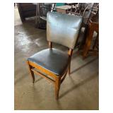 Wooden dining chair with faux leather upholstery