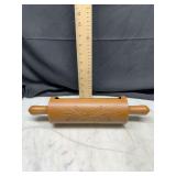 Wooden rolling pin style wall pocket