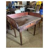 wooden work table with backsplash and single drawer