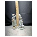 Pair of porcelain girl and goose figurines