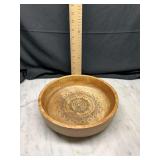 Carved wooden bowl with mandala design