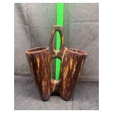 Ceramic double vase with stirrup handle