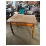 Wooden table with print enameled top