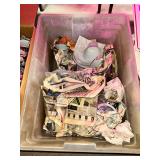 Plastic Storage Bin Containing Wrapped Dinnerware and Tableware