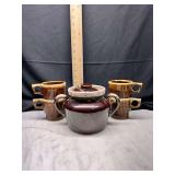 Brown drip pottery bean pot and 4 fluted coffee mugs