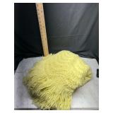 yellow crocheted fringe throw blanket