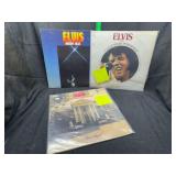 3 Elvis vinyl records moody blue, Graceland and vol 1