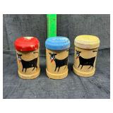 3 vintage wooden cow shakers
