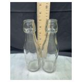 2 crown top bottles
