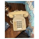 beige desktop touch tone telephone