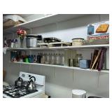2 shelves of small kitchen appliances, pressure cooker, jars, decor