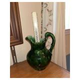 Green glazed ceramic pitcher